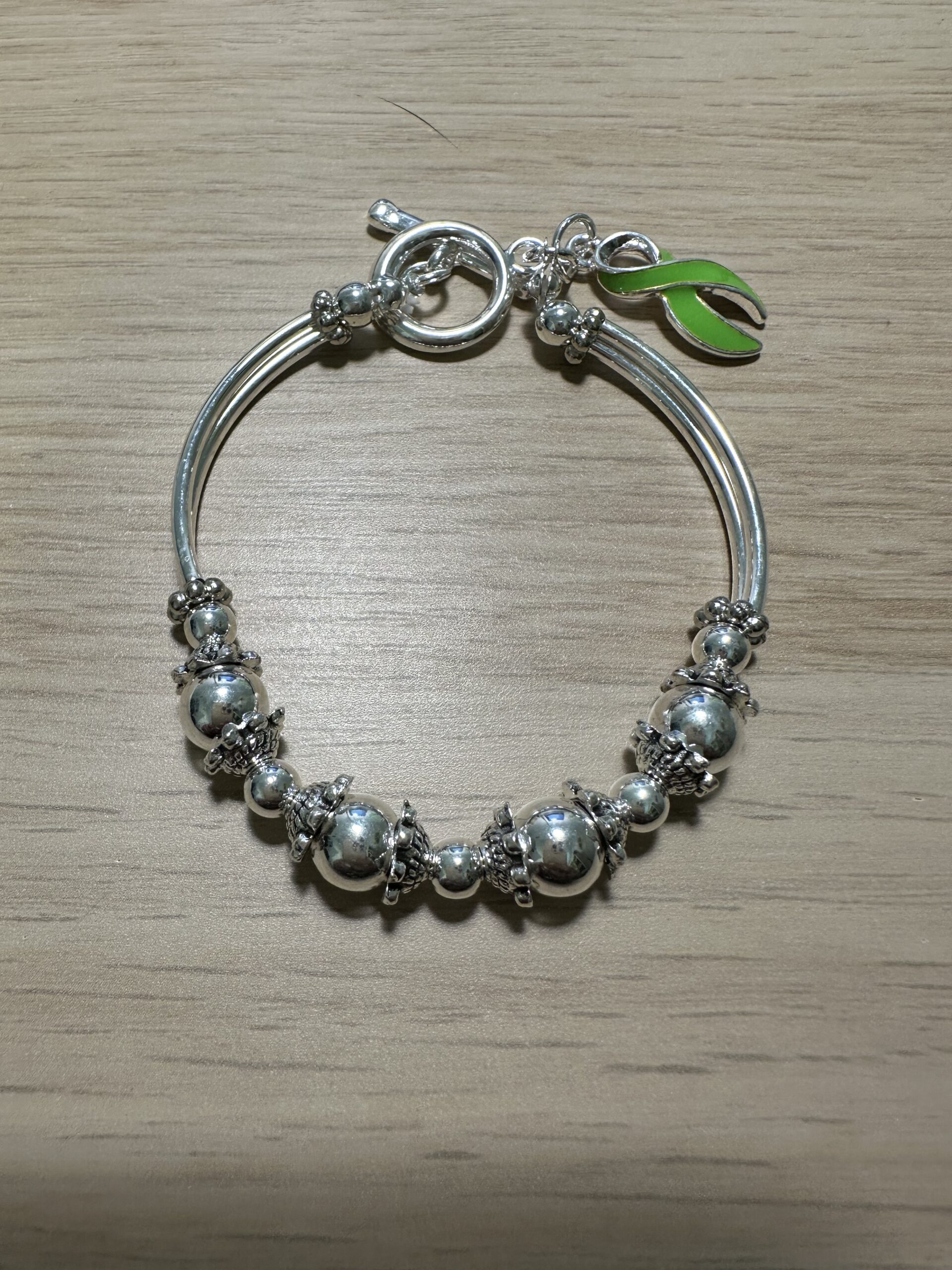 Silver Fob bracelet with lime ribbon - Lymphoma Australia